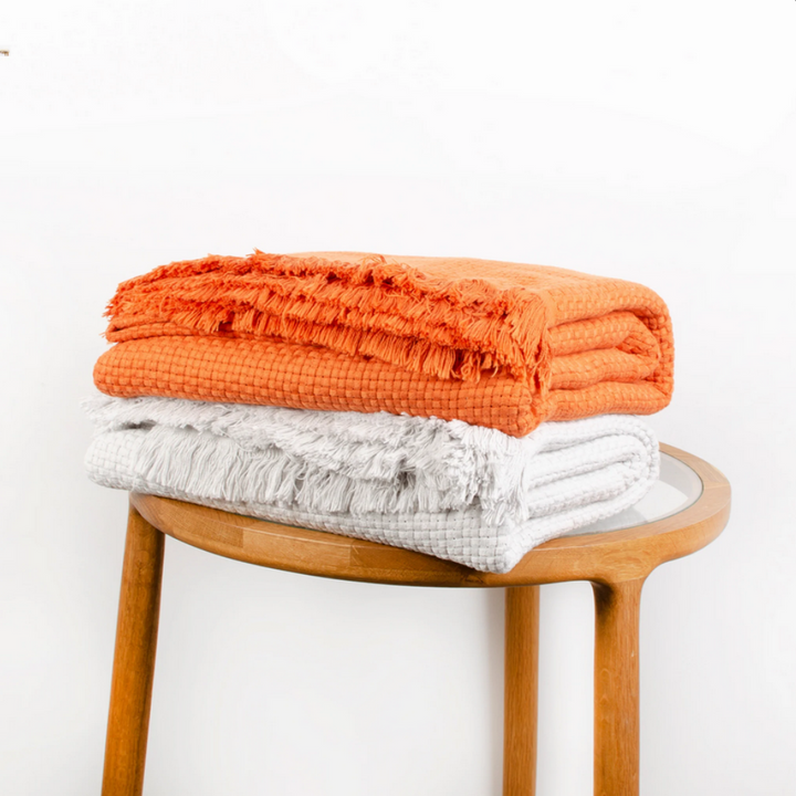 Seven Seas Cape Throw Terracotta Lifestyle | Merchants Homewares