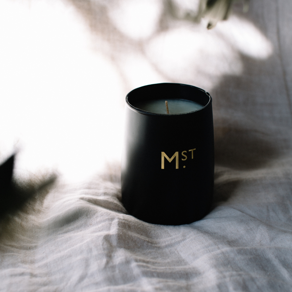 Moss St Candle Suede & Violet 320g Black lifestyle | Merchants Homewares