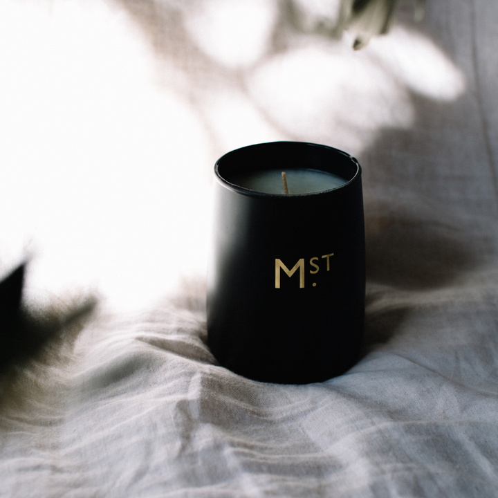 Moss St Candle Suede & Violet 320g Black lifestyle | Merchants Homewares