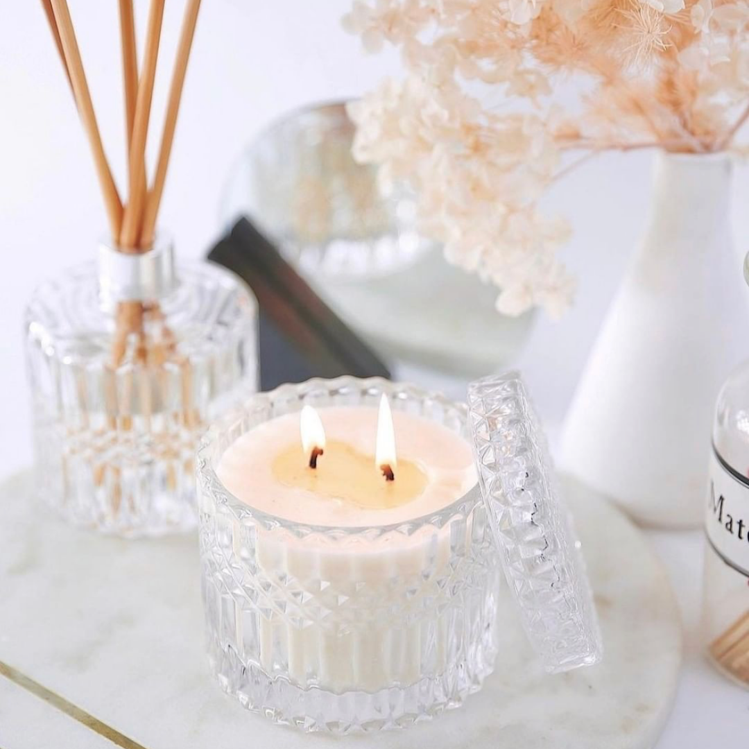 Home Fragrance Collection Mrs Darcy Candle Burning Diffuser In Background | Merchant Homewares