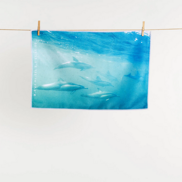Destination Label Tea Towel Dolphin Play | Merchants Homewares