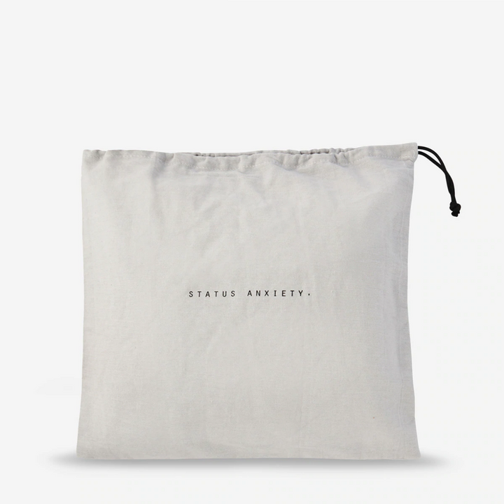 Status Anxiety Art of Pretending Bag Black Drawstring Bag | Merchants Homewares